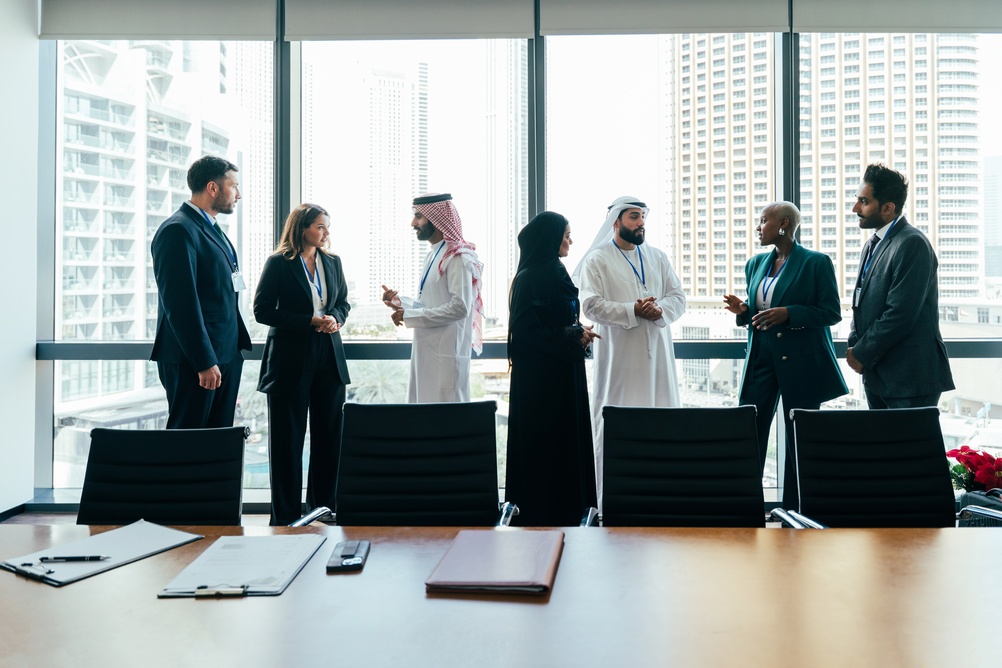 Diverse,Business,Professionals,Wearing,Formal,Attire,And,Traditional,Dress,Standing